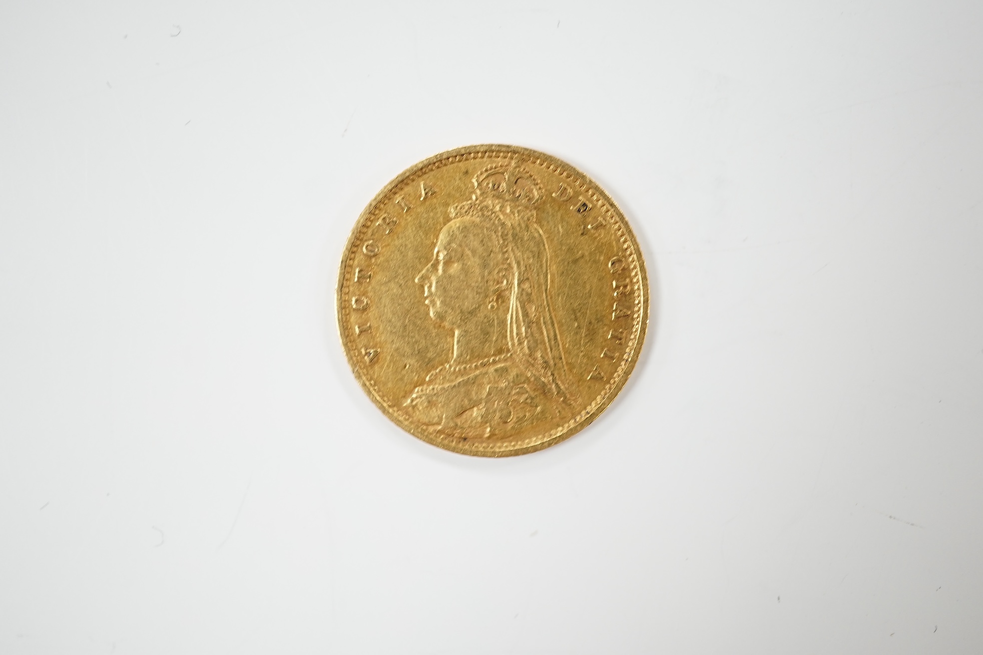 A Victorian 1890 gold half sovereign, about VF.